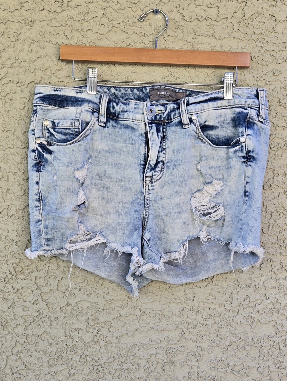 Torrid light blue distressed denim shorts
